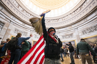 epa08926300 Supporters of US President Donald J. Trump and his baseless claims of voter fraud run through the Rotunda of the US Capitol after breaching Capitol security during their protest against Congress certifying Joe Biden as the next president in Washington, DC, USA, 06 January, 2020 (issued 08 January 2020). On 08 January Assistant House Speaker Katherine Clarke said the House will move to impeach President Trump if the Vice President and Cabinet do not remove him on their own. EPA/JIM LO SCALZO