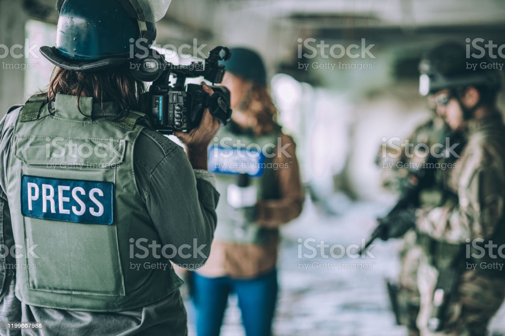 Two young journalists reporting from the war zone