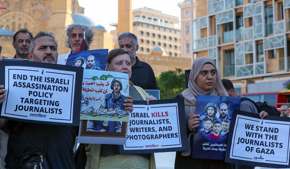 epa12343389 Lebanese journalists gather at Martyrs' Square during a vigil for journalists killed in Gaza, in Beirut, Lebanon, 01 September 2025. According to the International Federation of Journalists (IFJ), at least 219 Palestinian journalists and media workers have been killed in the conflict in Gaza since 07 October 2023. EPA/WAEL HAMZEH